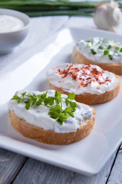 istock Sour cream spread with home made bread 1192723249