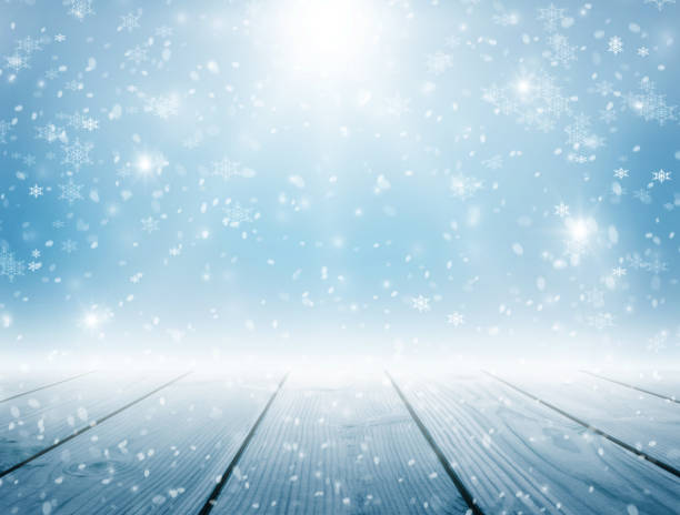 istock Winter Christmas background with falling snowflakes on blue background. Background for design with copy space 1192724108