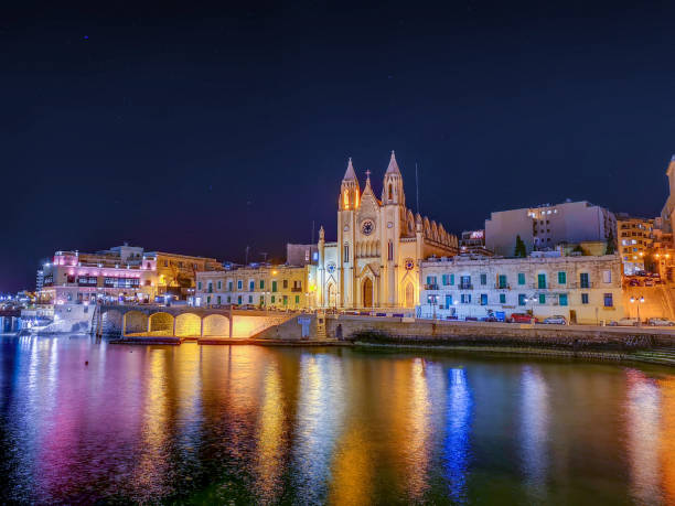Church of Our Lady of Mount Carmel at night, St.Julians Church of Our Lady of Mount Carmel at night, St.Julians, Malta st julians bay stock pictures, royalty-free photos & images
