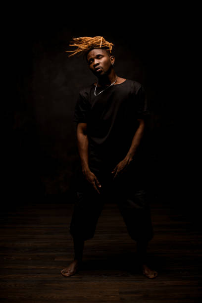 istock African american guy posing in all black outfit 1192728495