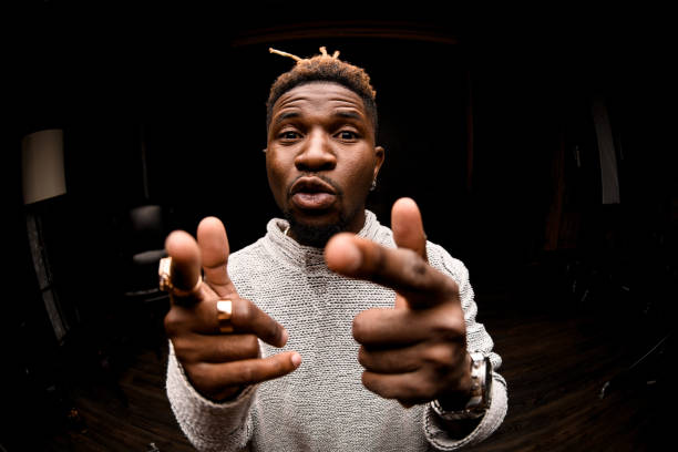 istock Afro american guy pointing with his fingers 1192728656