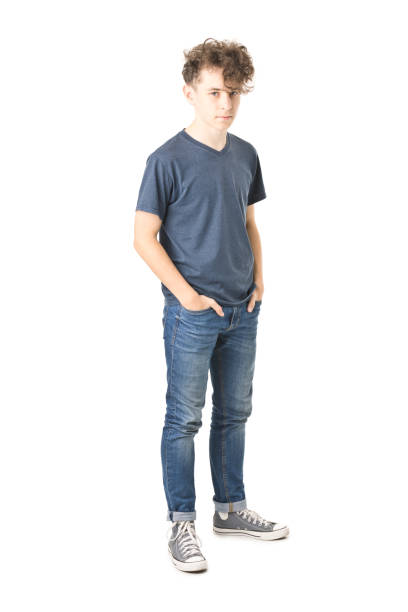 istock 12 years old boy isolated on white - full body picture 1192729811