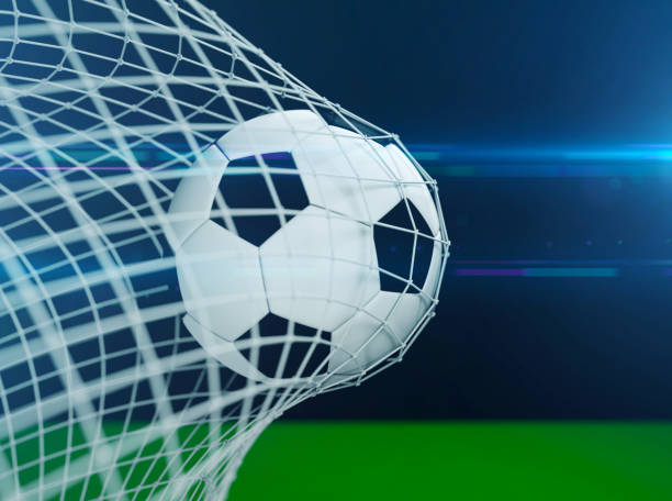 istock Soccer ball in goal 1192735338