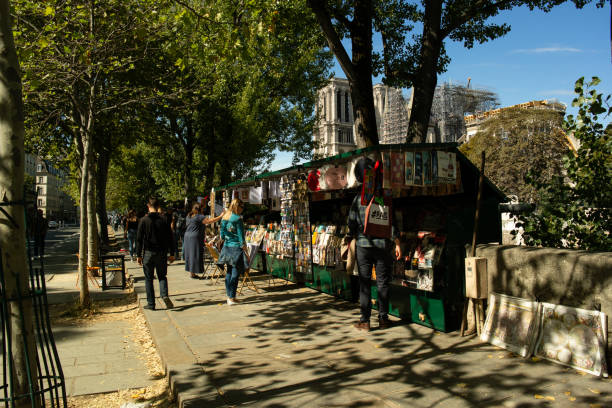 Paris (5º arrondissement), September 2019 - Traditional Parisian area known as the Latin Quarter. Pictured are the vendors standing on the banks of the Seine near Notre Dame Cathedral.