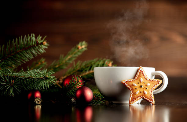 Cup of coffee and gingerbread cookie on a table