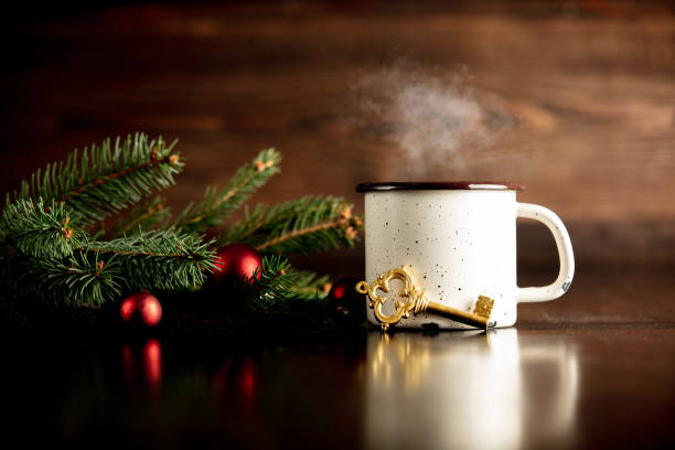 istock Cup of coffee and gingerbread man cookie 1192737447