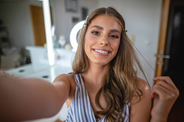 istock Beautiful young model with stage make-up at a beauty studio 1192741773