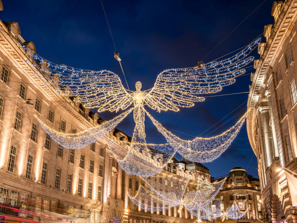 angel shape decorations on regent street in christmas holiday - urban scene regent street city of westminster inner london imagens e fotografias de stock