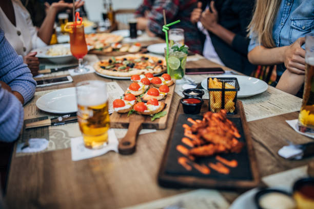 istock Friends enjoying in pub 1192743884