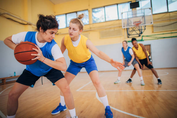 istock Basketball team practicing on basketball court 1192745692