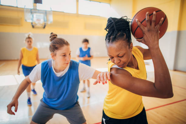 istock Basketball team practicing on basketball court 1192745722