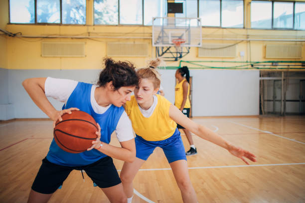 istock Basketball team practicing on basketball court 1192745805