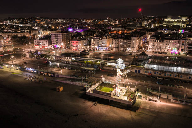 Brighton Seafront Nightlife With Bars Pubs and Clubs Aerial View Brighton's vibrant nightlife is illuminated at night with the countless pubs, clubs and bars which are gay friendly brighton england stock pictures, royalty-free photos & images