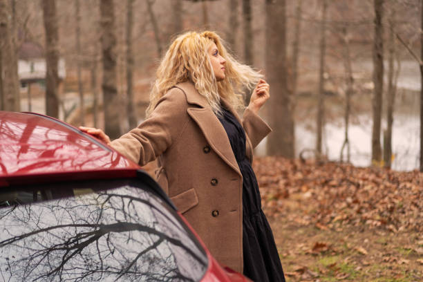 istock Woman and car 1192748720