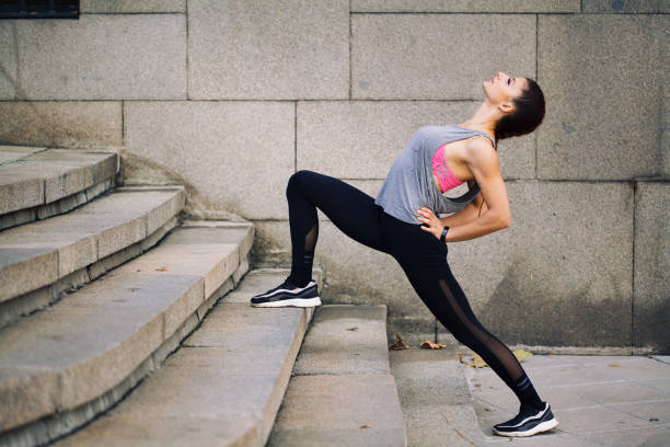 istock Sportswoman doing lunges 1192756090