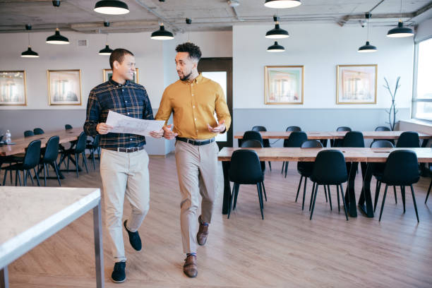 istock Two business people in the office 1192759700
