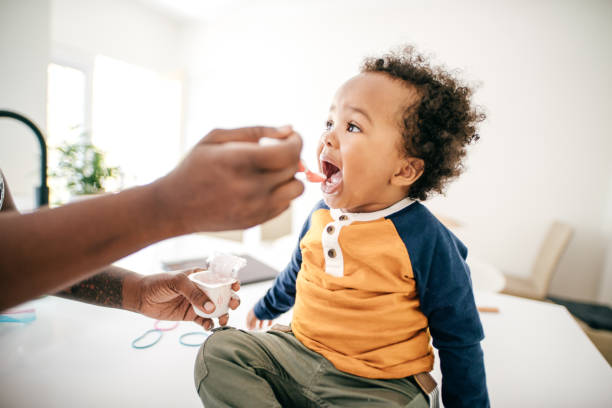 istock Toddler eating yogurt 1192759729