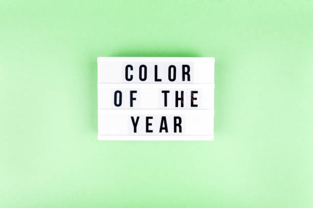 istock Retro lightbox with Color of the year wording on the trendy solid green backdrop 1192760129
