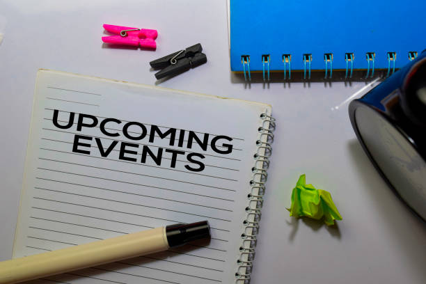 istock Upcoming Events write on book isolated on white background. 1192767140