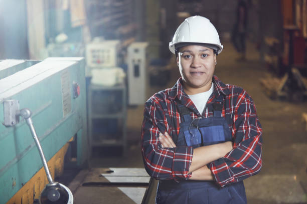 istock Mixed-Race Female Worker Posing at Plant 1192778678