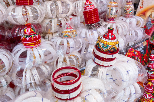 Traditional bangles Shakha, pairs of white Conch shell bangles, to be worn by Bengali Hindu bride while getting married. Being sold at Kalighat, Kolkata, West Bengal, India.