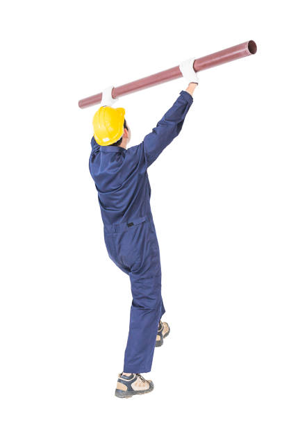 istock Young handyman in uniform Cutout isolated on white background 1192792332