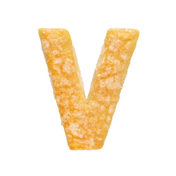 istock Letter V made from cookie isolated on white background 1192794274
