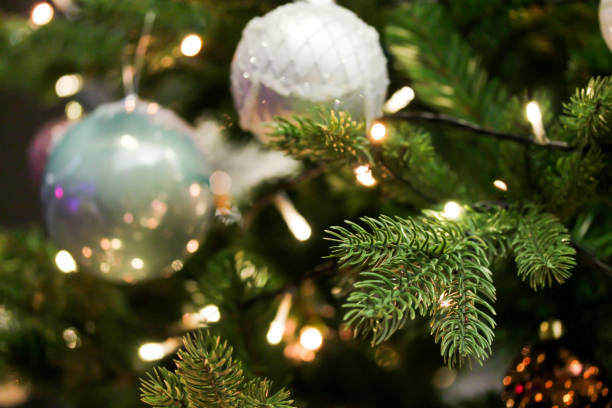 istock Christmas tree decorated with blue and white baubles 1192794404