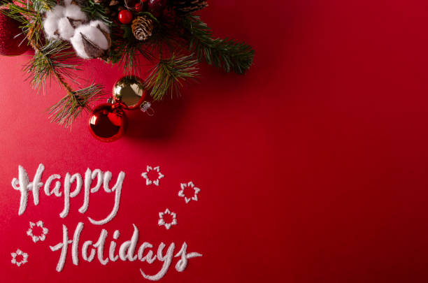 istock happy holidays  on red background 1192817292