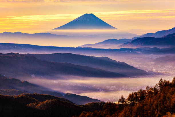 Fuji Mountain and Morning Mist at Takabocchi Highlands, Nagano, Japan Fuji Mountain with Morning Mist at Takabocchi HIghlands in Autumn, Nagano, Japan suwa lake photos stock pictures, royalty-free photos & images