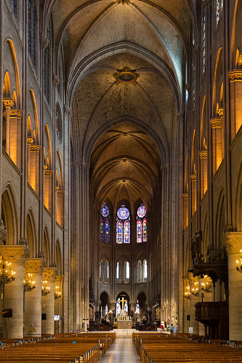 PARIS, FRANCE - JUNE 23, 2017: Interior of the Notre-Dame de Paris church. Is a medieval Catholic cathedral and is considered to be one of the finest examples of French Gothic architecture.