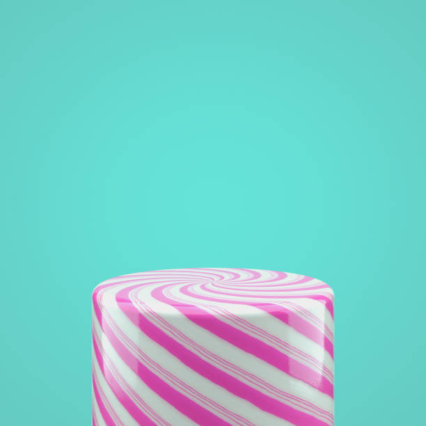 Empty pink candy cylinder box for product display.