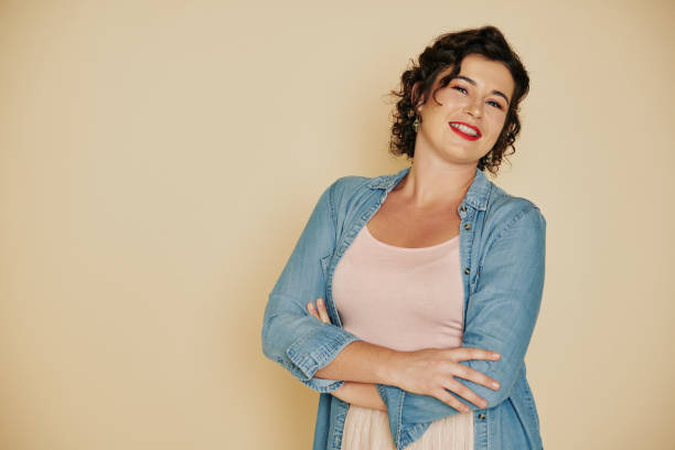 istock Happy beautiful young woman 1192825959