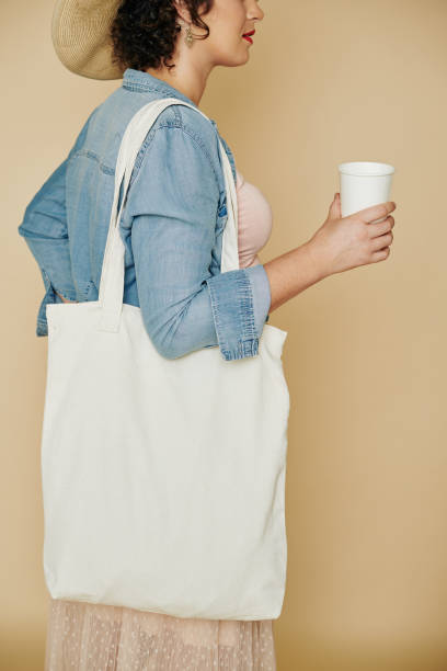 istock Woman drinking cup of water 1192826042