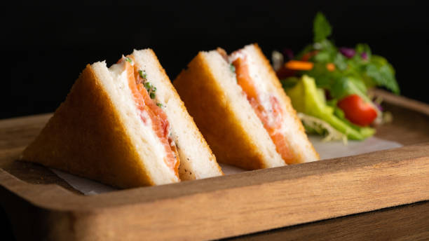 Fresh sandwiches Triangle sandwiches on a plate sandwich club sandwich lunch restaurant stock pictures, royalty-free photos & images