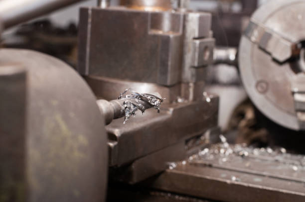 istock Metal processing by lathe machine. cutting tool at mechanical turning metal working. 1192830881