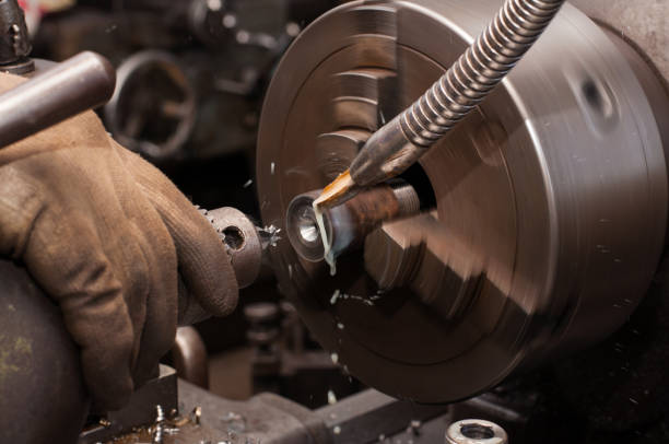 istock Metal processing by lathe machine. cutting tool at mechanical turning metal working. 1192831044