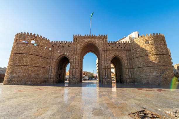 Exterior view of the masoned Makkah Gate or Baab Makkah, an old city gate at the entrance to the historic town (Al Balad) of Jeddah, Kingdom of Saudi Arabia Former entrance to the city of Jeddah, when coming from Mecca. December 7th 2019, Jeddah, Saudi Arabia social history photos stock pictures, royalty-free photos & images