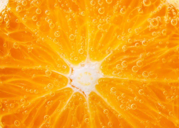 istock orange fruit close up macro, background texture. healthy diet. fruit for juice, selective focus 1192834364