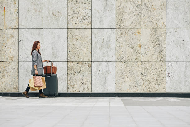 istock Woman hurrying to terminal 1192836820