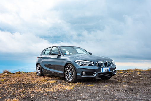 Rocky Mountain House, Alberta - July 22, 2021: A BMW 4 series sports car parked along a road in rural Alberta