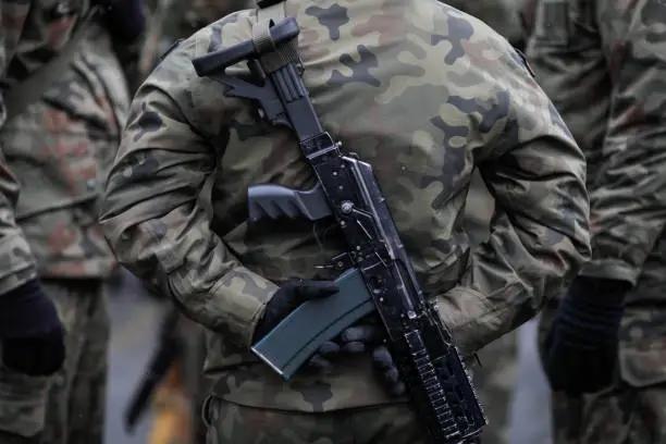 Polish soldier armed with Beryl assault rifle at the Romanian National Day military parade