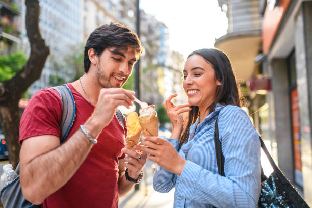 istock Young Tourists Sharing Ice Cream in Downtown Buenos Aires 1192840505