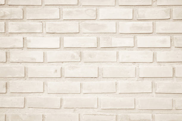istock Brown brick wall texture background in room at subway. Brickwork stonework interior, rock old clean concrete grid uneven abstract weathered bricks tile design, horizontal architecture wallpaper. 1192840594