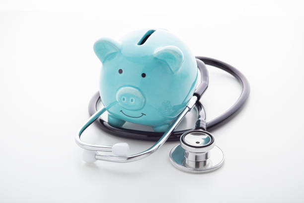 istock Piggy bank with stethoscope 1192840666