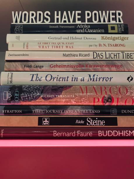 istock Words have power, stack of books 1192841444