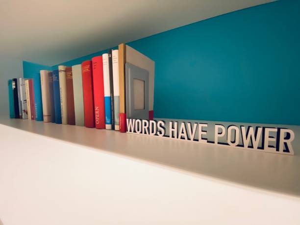 istock Words have power, row of books 1192841510