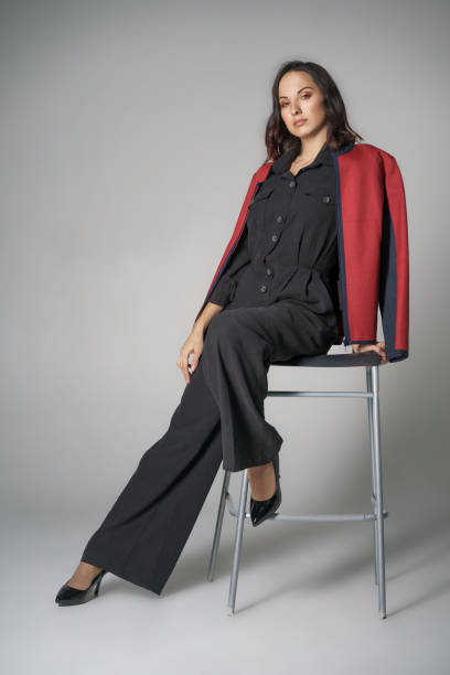 istock fashion model posing in clothes on white background 1192842011