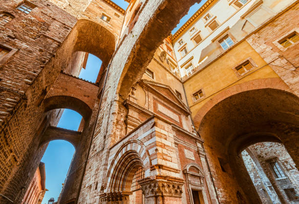 Perugia, Italy - October 26, 2019: Via delle Volte Road in Perugia historic center, with its characteristic medieval arches and vaults