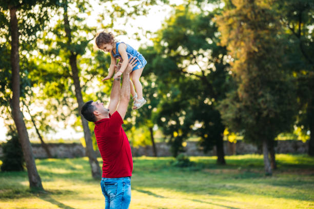 istock Father makes his daughter to fly 1192844411